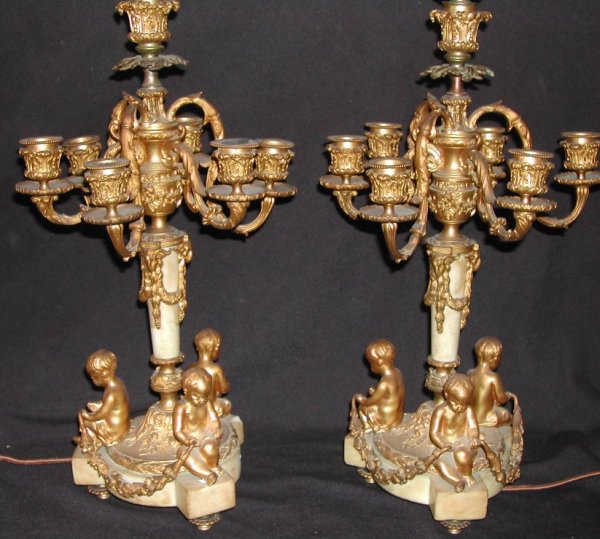Pair 19thCentury French bronze cherub candelabra,