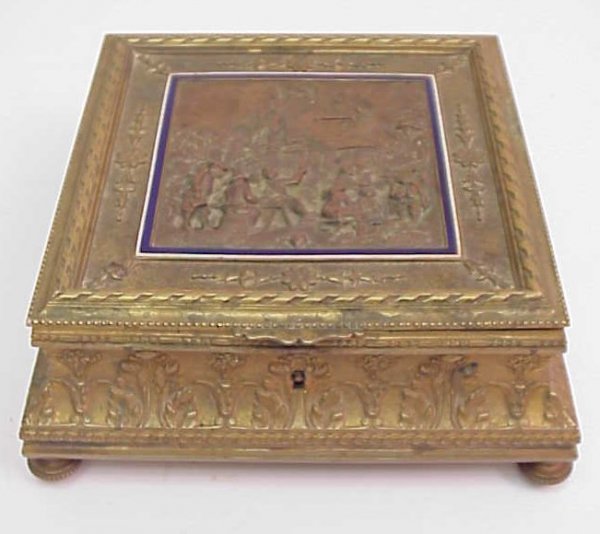Bronze scenic relief footed jewel box with blue an
