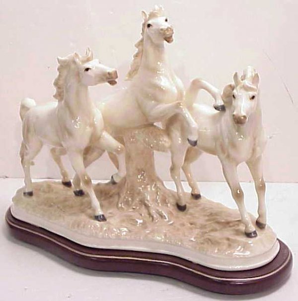 Cap D Monte figural group three horses, glazed po