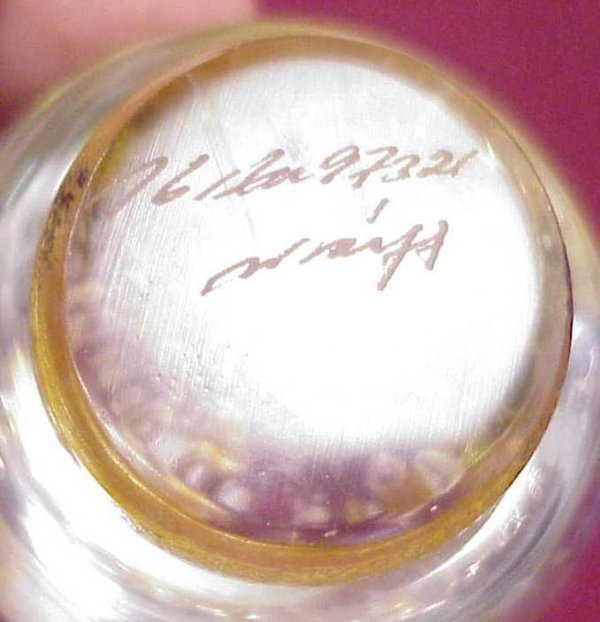 Signed glass paperweight and a small art glass bowl - 3