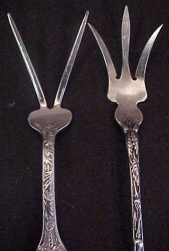 2 sterling serving forks - 2