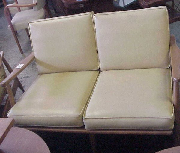 Pair of Thonet Danish modern spindle back Settees: Pair of Thonet Danish modern spindle back Settees, hardwood frames, vinyl cushions, 30" h x 49" W x 34" D., some waer to finish, Provenance; Dominican Convent ordered directly from Thonet Park Ave. sh