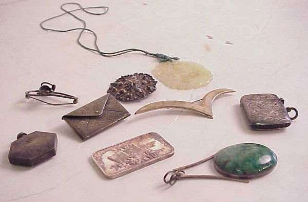 Mostly silver jewelry and one ounce silver bar,: Mostly silver jewelry and one ounce silver bar, jade pendant, Victorian silver matchsafe, sterling envelope pin, silver perfume, Mexican sterling pin, Israeli silver and green stone pendant, round sil