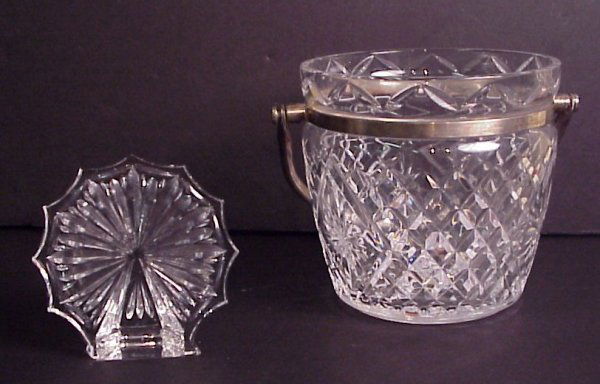 Waterford crystal ice bucket with silver plate han: Waterford crystal ice bucket with silver plate handle 6 1/4"h and a Waterford crystal decorative object, 4 3/4"h
