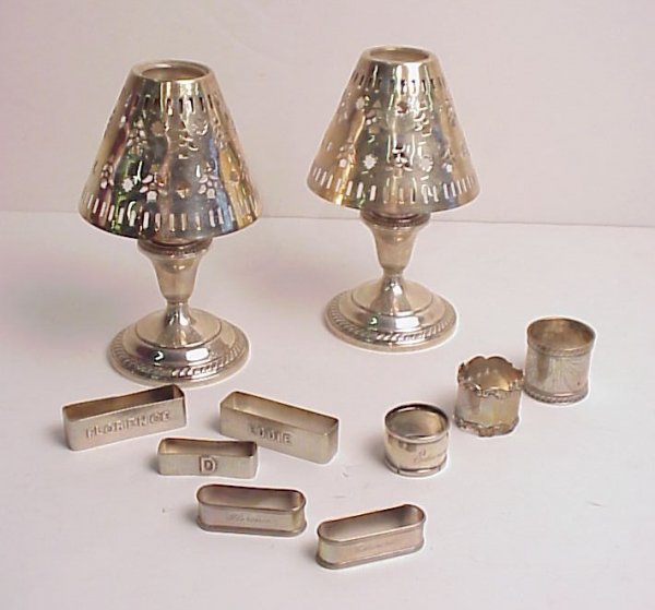 Six sterling silver napkins, 5 oz., 2 Victorian si