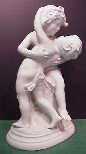 FRENCH BISQUE OF TWO CHILDREN,SIGNED MADRASSI 