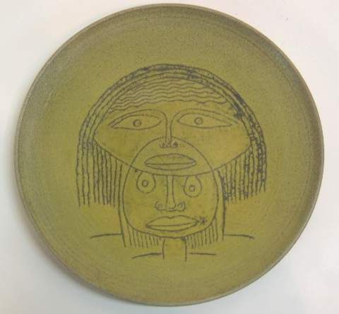 EDWIN & MARY SCHEIER GREEN STONEWARE PLATE W/ FIG: EDWIN & MARY SCHEIER GREEN STONEWARE PLATE W/ FIGURES UNSIGNED.11"D THIS WAS A WEDDING GIFT TO BETTY FROM THE SCHEIER'S JUNE 57