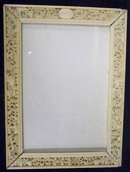 CARVED BONE FIGURAL PICTURE FRAME, CHIP IN TOP RIGH