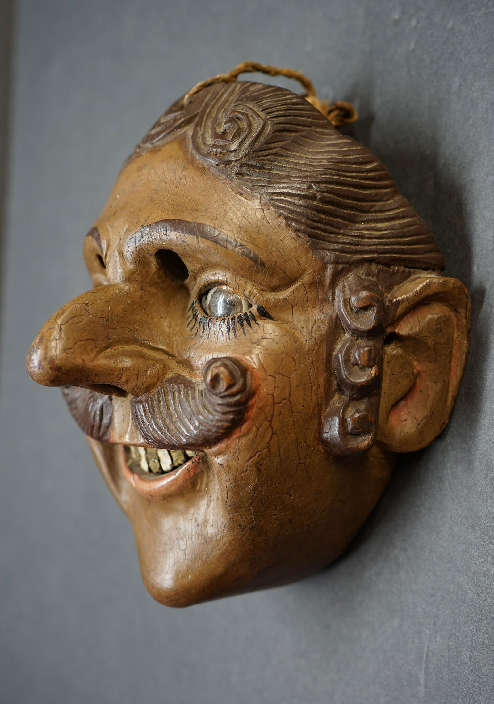 antique wood mask with glass eye (1 of 14)