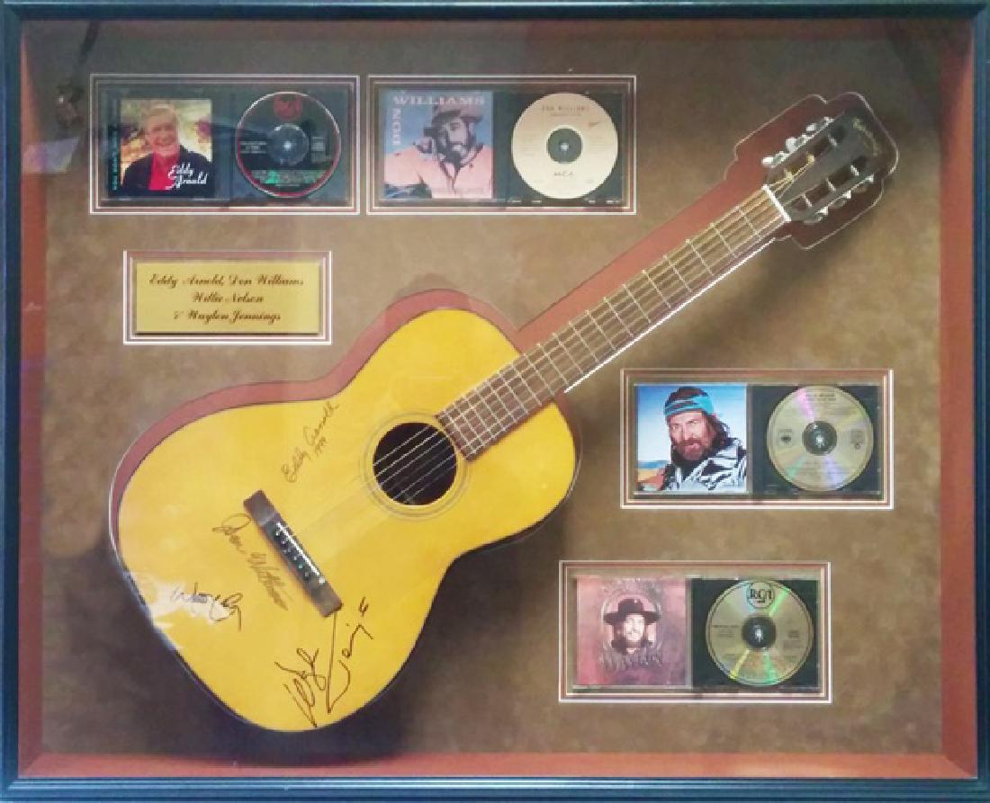 Autographd Acoustic Guitar -WillieNelson: Autographed Acoustic Guitar Autographed by artists – Willie Nelson, Eddy Arnold, Don Williams, and Waylon Jennings Comes with (1) Autographed Guitar, (4) Artist CD’s with Case and Booklet Total Fr