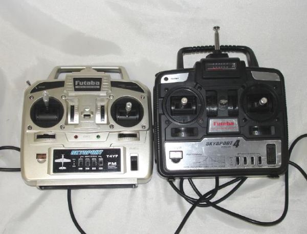 LOT 2 FUTABA RC GAS AIRPLANE REMOTE CONTROLS TRAINER +: This is a lot of 2 Futaba RC Radio Control Remote Airplane plane controllers. They were brought in as working. Both power up and appear fine. One is a Skysport 4 T4VF with Trainer capabilities (master