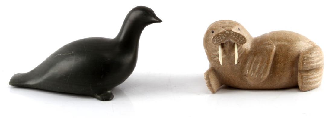 LOT OF 2 INUIT STATUES GREENSTONE POLISHED STONE: Lot of 2 Inuit statues. Polished walrus statue with tusks. Measures 5" L. Nice condition. Tusks (bone) intact. Greenstone bird statue. Measures 7 1/2" L. Has engraving on bottom: "E9-36 BV11575-1"