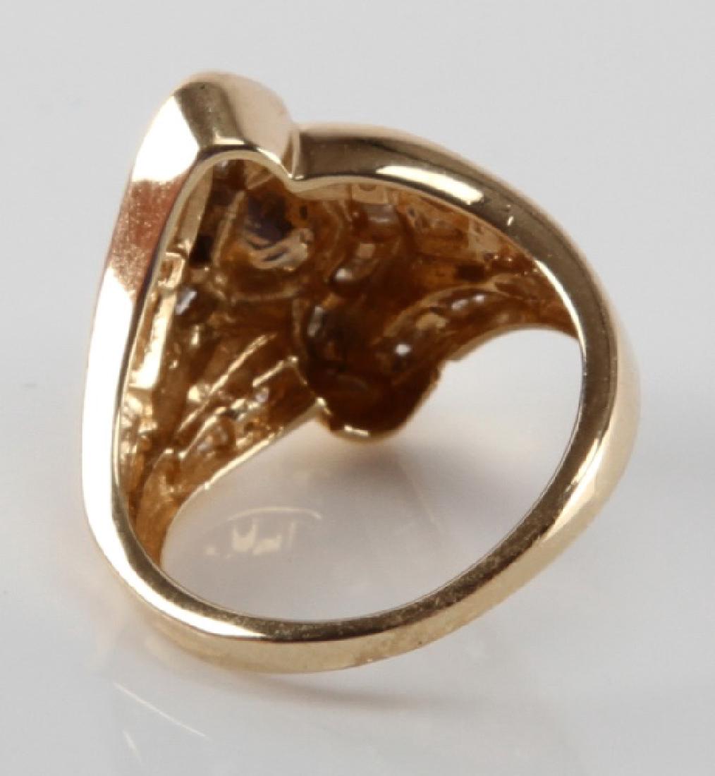 ADIES 14K YELLOW GOLD AND DIAMOND RING: Ring weighs approximately 5.8 grams and measures to size 6. Features 4.5mm center stone, 18, 1mm round stones, and 28 , emerald cut stones of varying size. Smaller stones vary in color and clarity, bu