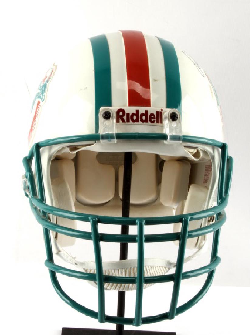 AUTOGRAPH DAN MARINO FULL-SIZE HELMET NFL RIDDELL: Full-size Riddell Helmet signed by the legendary NFL Miami Dolphins quarterback (1983-1999). Inscribed with "Dan Marino 13" on side. No COA. Guaranteed authentic.