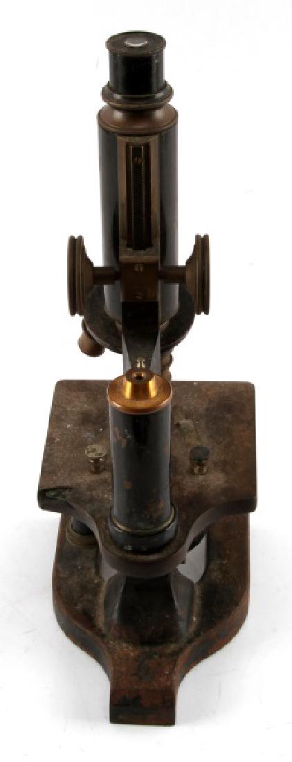 SPENCER 1906 BRASS AND IRON MONOCULAR MICROSCOPE: A monocular microscope from the Spencer Lens Co, Buffalo, New York. The patent date (Dec 11 1900) and what may be a manufacture date (Aug 28 1906) are both engraved in the metal post supporting the op