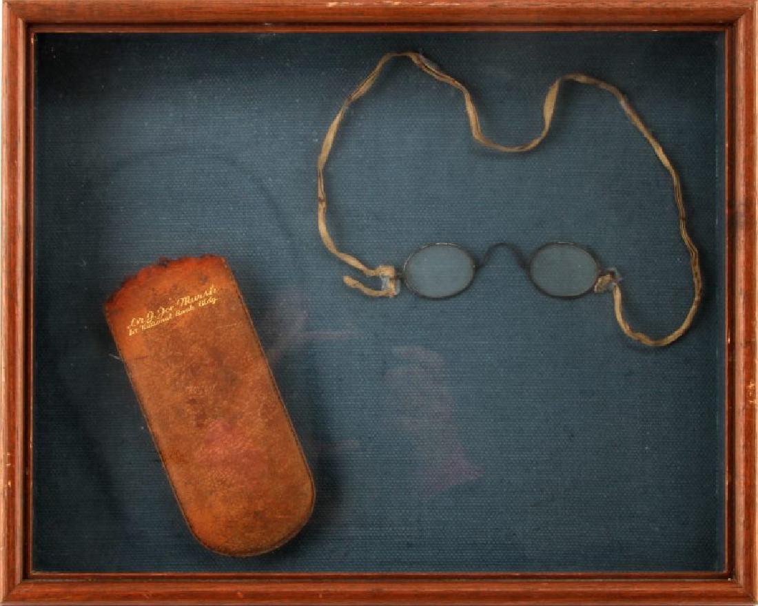 CIVIL WAR ERA SPECTACLES & CASE IN FRAME: DR. J. Joe Marsh on the case, linen string holder on spectacles. Frame measures 13 by 10 inches.