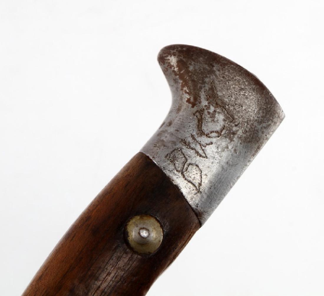 WWI 11 INCH ANTIQUE WAR TRENCH KNIFE: Measures 11" long. Has a maker mark of a knight's profile and a king's profile, with "KXC" engraved beneath it. The name "BUCK" is etched into the bottom of the handle. In very good condition with som