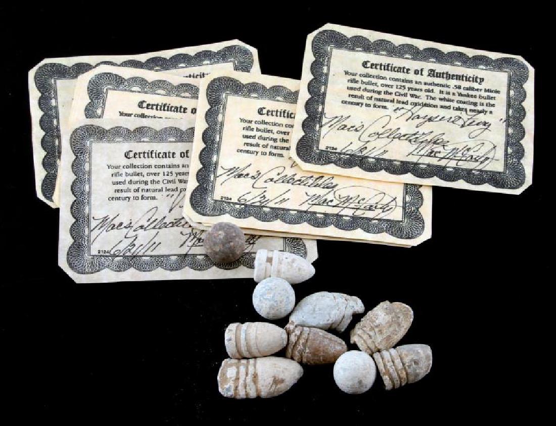 CIVIL WAR UNION YANKEE 10 MINIE BALLS WITH COA: 10 Union Minie balls with with 9 COAs, dated 6/21/11. All .58 caliber Minie rifle bullets. In good condition.
