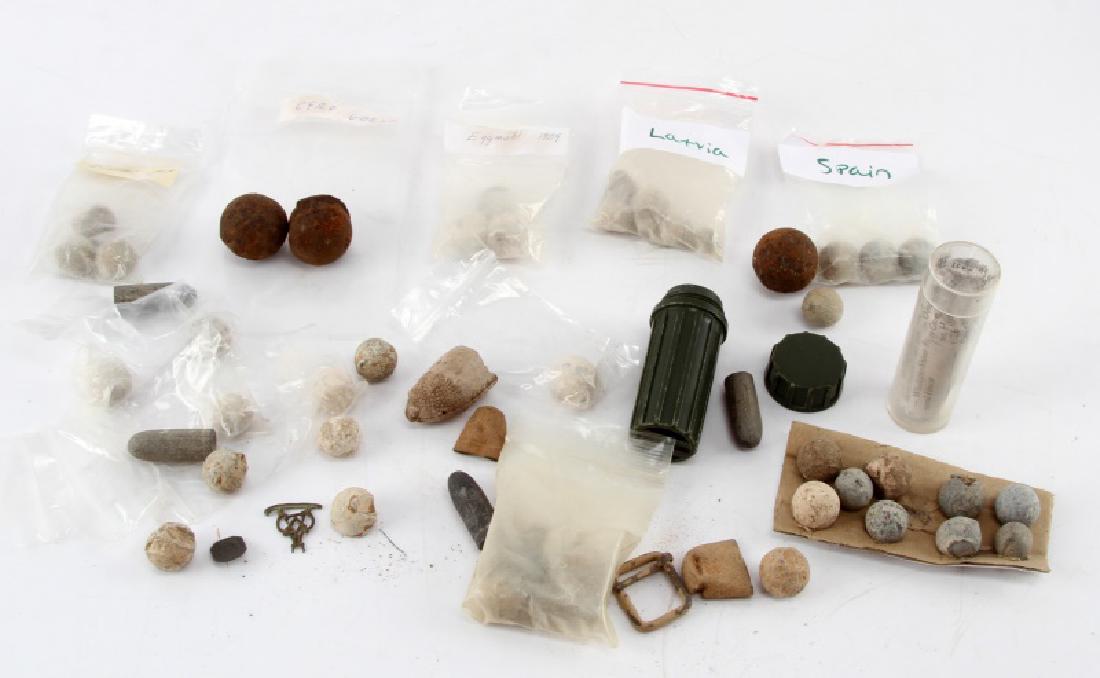 LOT OF 50 PLUS ANTIQUE EUROPEAN MUSKET BALLS: Lot of over 50 assorted musket balls, shells, and bullets from Europe. Five from Latvia, three from Spain, two from Cero Gordo, three from Dresden, 1813, three from Eggmuhl, 1809, and the rest are uni