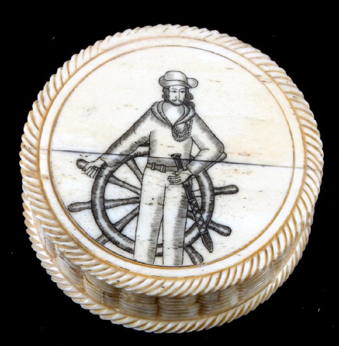 NAUTICAL COMPASS IN CARVED SCRIMSHAW BONE CASE: Sailor image on lid 23 mm by 60 mm, working compass inside, probably mid 20th century.