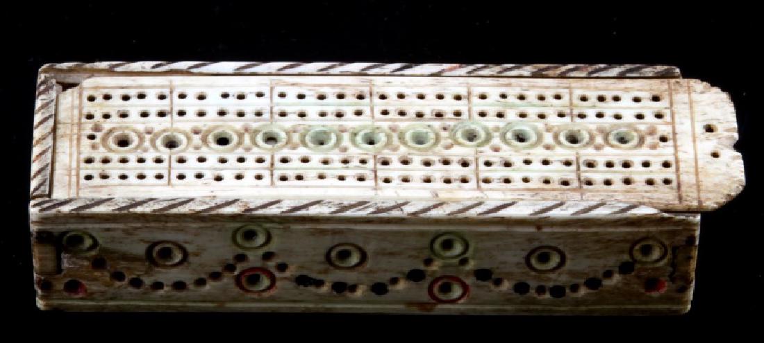 ANTIQUE BONE SCRIMSHAW DOMINO BOX & DOMINOS: Tung in groove and tiny nail construction, some slight damage to lid . Measures 120mm.