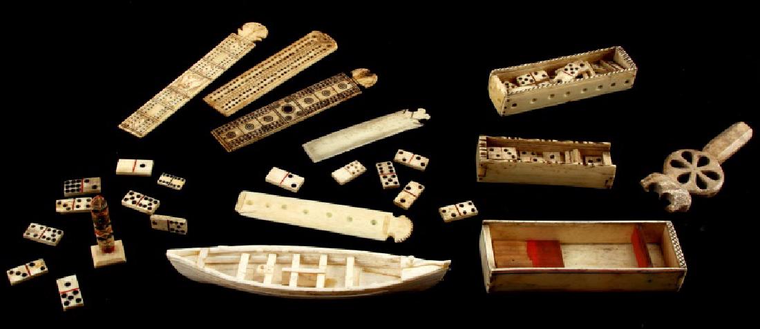 ANTIQUE BONE SCRIMSHAW & CARVING LOT: Parts and smalls, dominos, whaling boat with no mast, small totem and more.