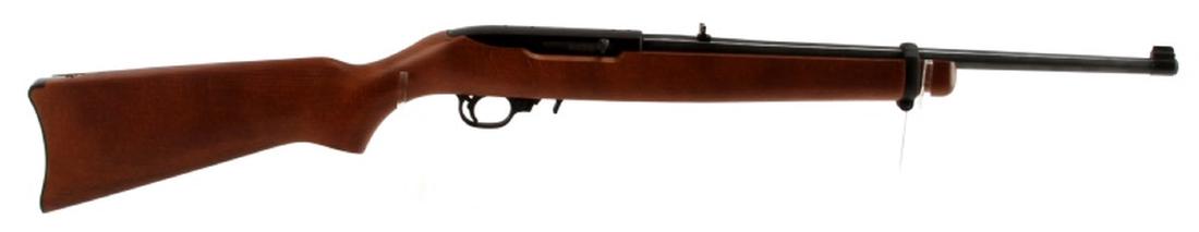 RUGER 10/22 LONG RIFLE IN .22 CALIBER: Light show of use present. Bore is bright and clean. Spotty rust to barrel. Overall in very good condition. Caliber: .22 Serial #: 0003-18744