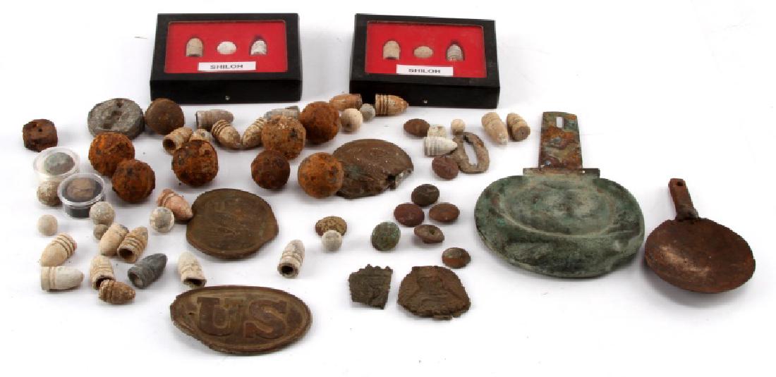 LARGE COLLECTION OF CIVIL WAR METAL DETECTOR FINDS: Mostly Union artifacts includes Belt plate, cartridge strap eagles, a shoulder scale, buttons, lots of minnie balls and a lead cooker. As photographed.
