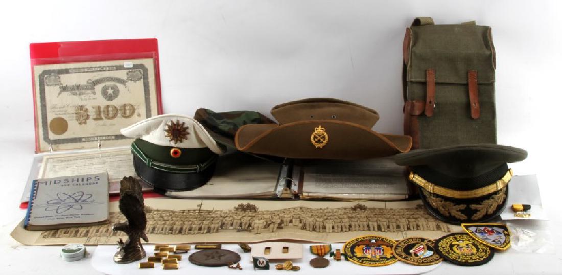 LARGE MULTI CONFLICT MILITARIA COLLECTIBLE LOT: Includes Australian Vietnam era slouch hat, screaming eagle in silver plate, Woodland pattern combat hat 7 1/4, U.S. Army felt 7 1/4 Army colonel visor, GDR visor, 1968 dated map box, Vietnam service