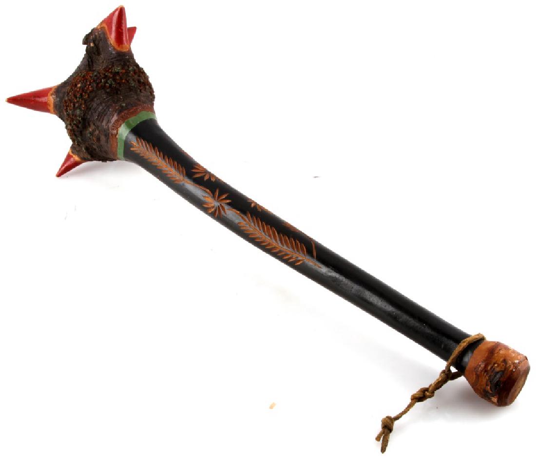 PENOBSCOT ANTIQUE C 1900 BIRCH ROOT WAR CLUB: A war club from the Penobscot tribe in Maine. Likely made around the turn of the century, when many of these clubs were made by the tribe for tourists. Features an intricately carve handle. Measures a