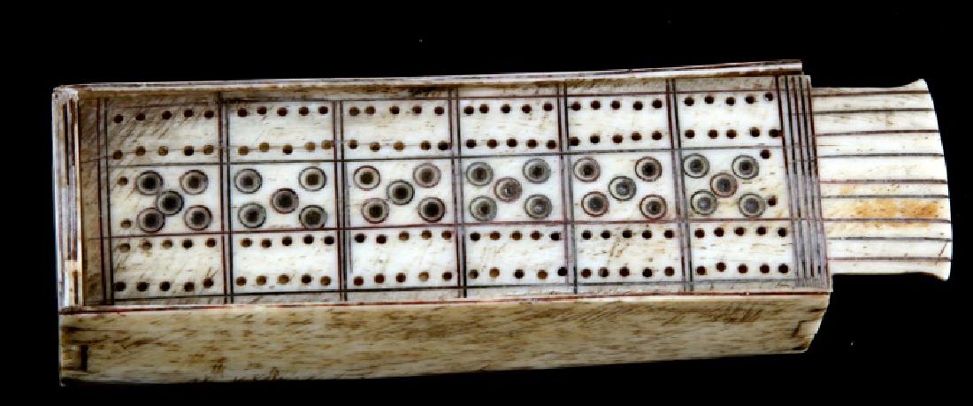 ANTOQUE BONE SCRIMSHAW DOMINO BOX & DOMINOS: Tung in groove and tiny nail construction, measures 120mm approximate. Slight area of damage to lid.