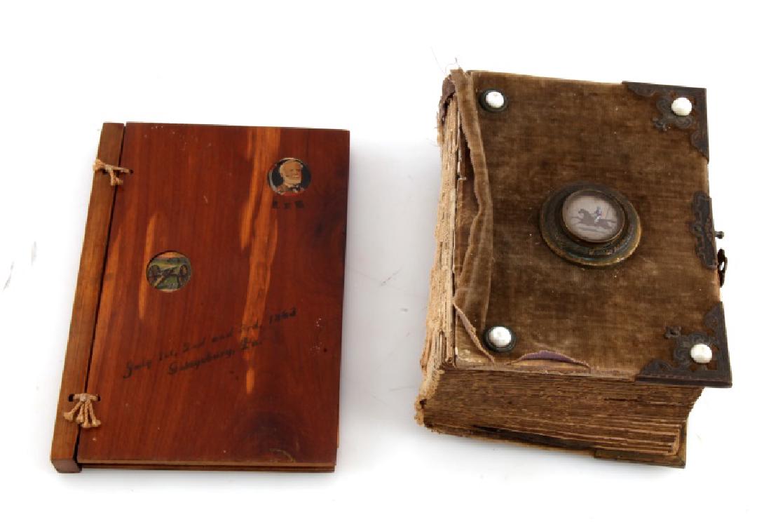 LOT ANTIQUE MINI BOOKS PHOTO ALBUM GETTYSBURG: Lot of two mini-books: 1) Antique cloth cover photo album with raised emblem on front, emblem on inside cover and fastener on side. Book in poor condition; heavy wear to cover and spine is gone, insid