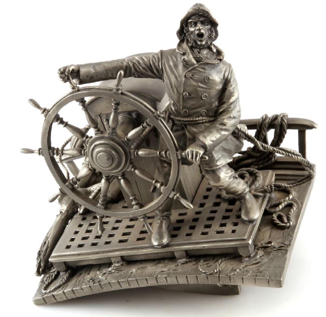FRANKLIN MINT INTO THE STORM FINE PEWTER JACKSON: Fine pewter nautical statue "Into the Storm" copyright 1985 by The Franklin Mint. Artist is Peter Jackson. Measures approximately 7 1/2"x6 3/4". Franklin Mint seal on bottom (part of statue), with nam