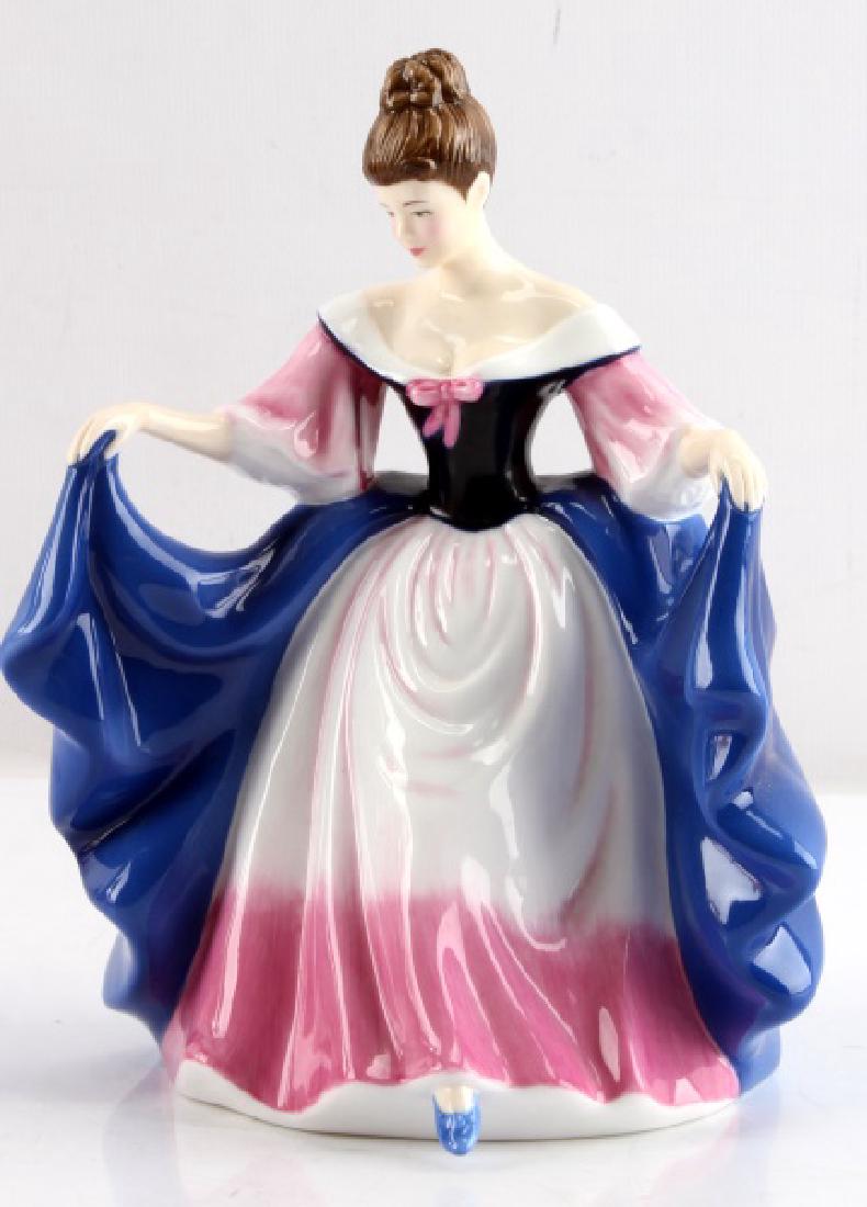 ROYAL DOULTON PRETTY LADIES SARA FIGURINE: Measures 7" tall by 4 1/2" wide. In excellent condition. Marked on bottom, "ROYAL DOULTON PRETTY LADIES Sara HN 4730." Also marked in black marker 040.