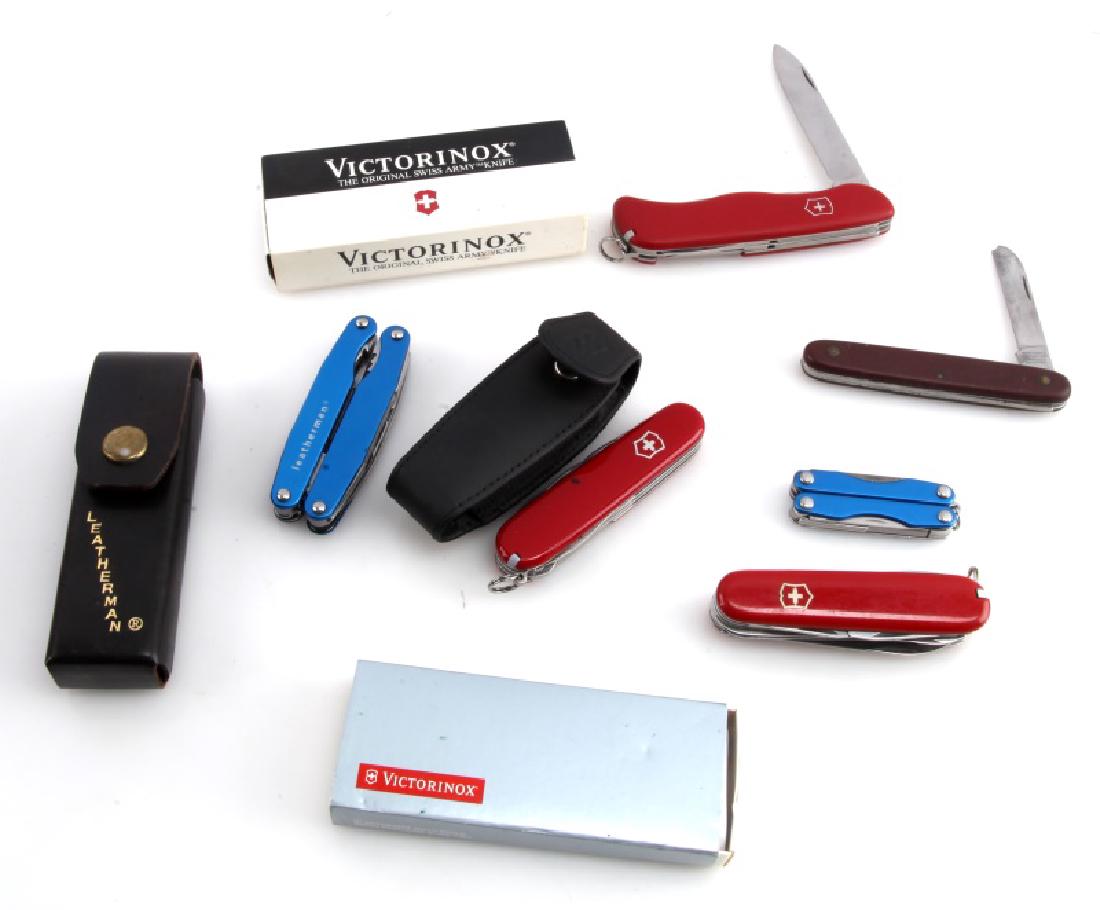 LOT OF LEATHERMANS AND COLLECTABLE SWISS KNVIES: Lot of 3 Leathermans and 4 Victornox collectable knives. All in very good or mint condition. Includes Leatherman Super Tool with sticker and original sheath, Leatherman Juice SC 2, Leatherman Squirt P