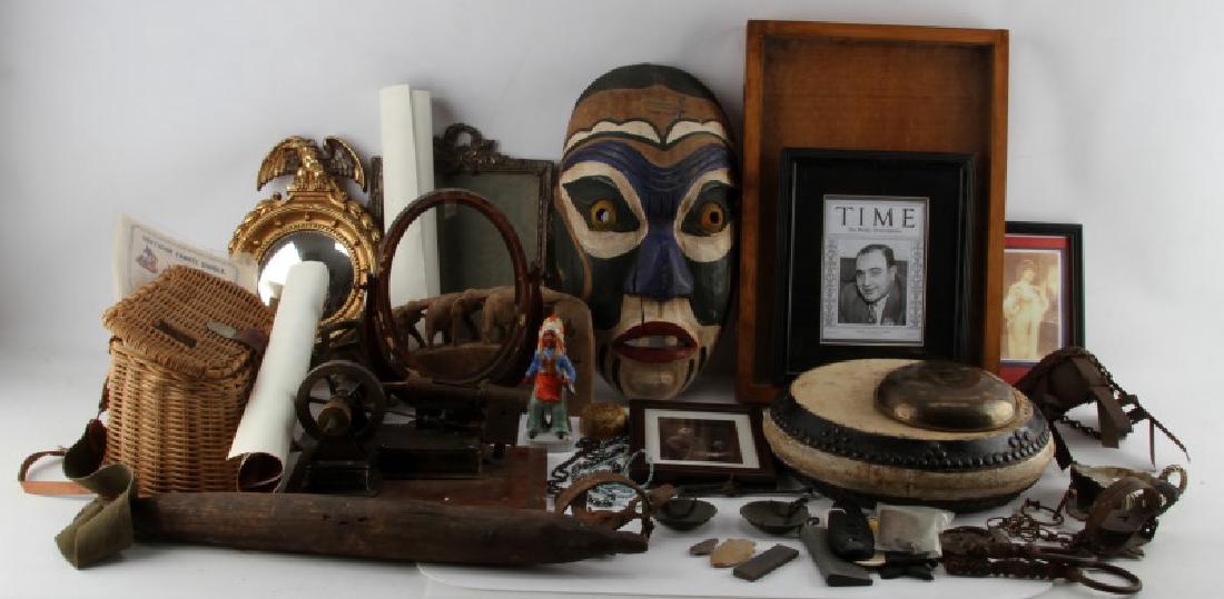 LARGE LOT OF ANTIQUES & COLLECTIBLED BIG VARIETY: Includes pistol grips and rifle butt plate, antique pad lock without key, whetstones, arrowheads, 2 Oneida Jump #1 traps, fishing creel wit vintage fishing tackle, Al Capone print, primitive rolling p