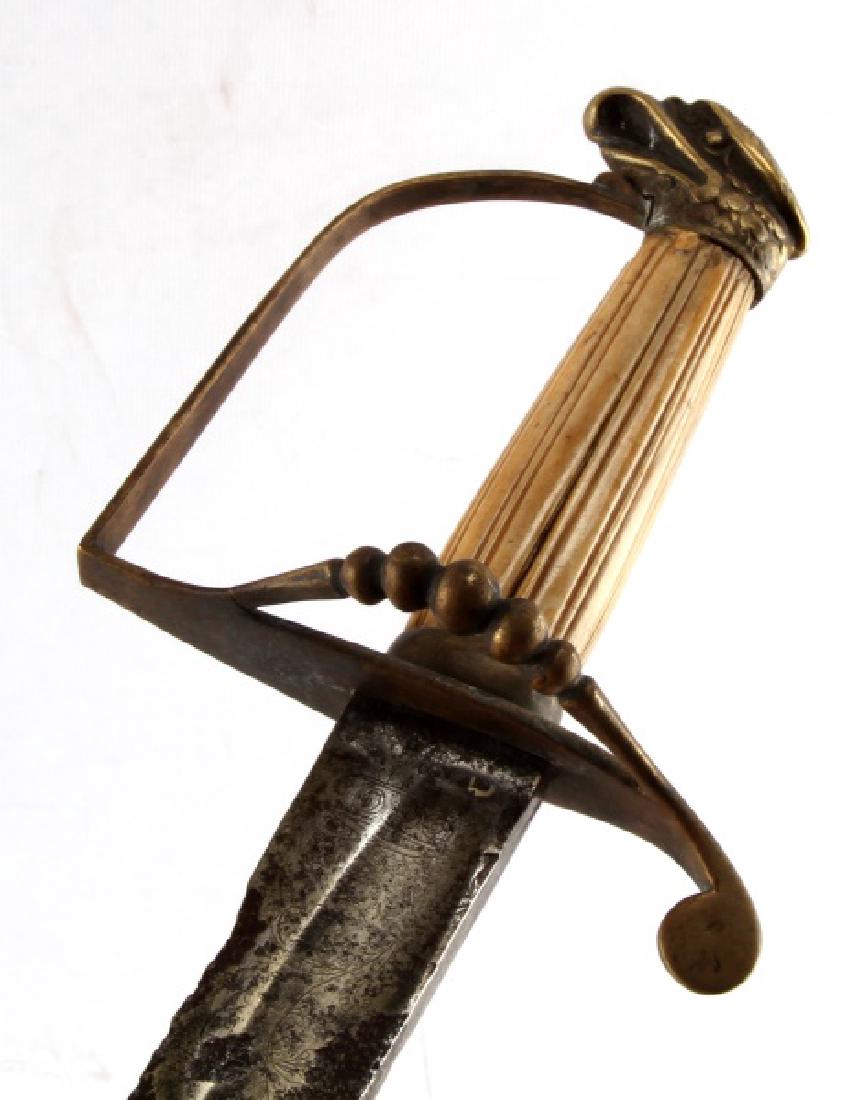 US OFFICERS EAGLE HEAD SWORD CIRCA 1805 W COA: U.S. Officers Eagle Head sword. Circa 1805. Brass hilt with eagle head pommel and brass 5 ball guard of light section characteristic for the period. Bone grip. 28 1/2” curved broad fullered blade wi