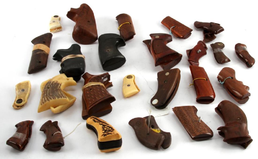 24 DIFFERENT PAIRS OF HANDGUN PISTOL GRIPS: Colt, Rossi, Smith and Wesson small to large sizes.