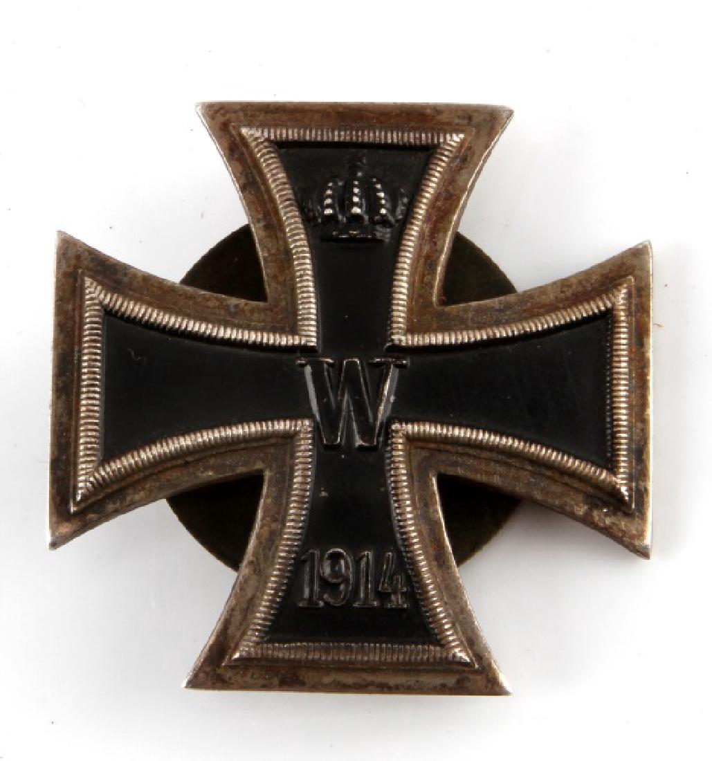 GERMAN WWII EK1 SCREWBACK IRON CROSS 1ST CLASS: German WWII Ek1 screw back Iron Cross 1st Class. In very good condition. Maker mark stamped "Godet Berlin". Has light tarnishing on obverse and reverse. Unauthenticated, sold as is. This lot has a res