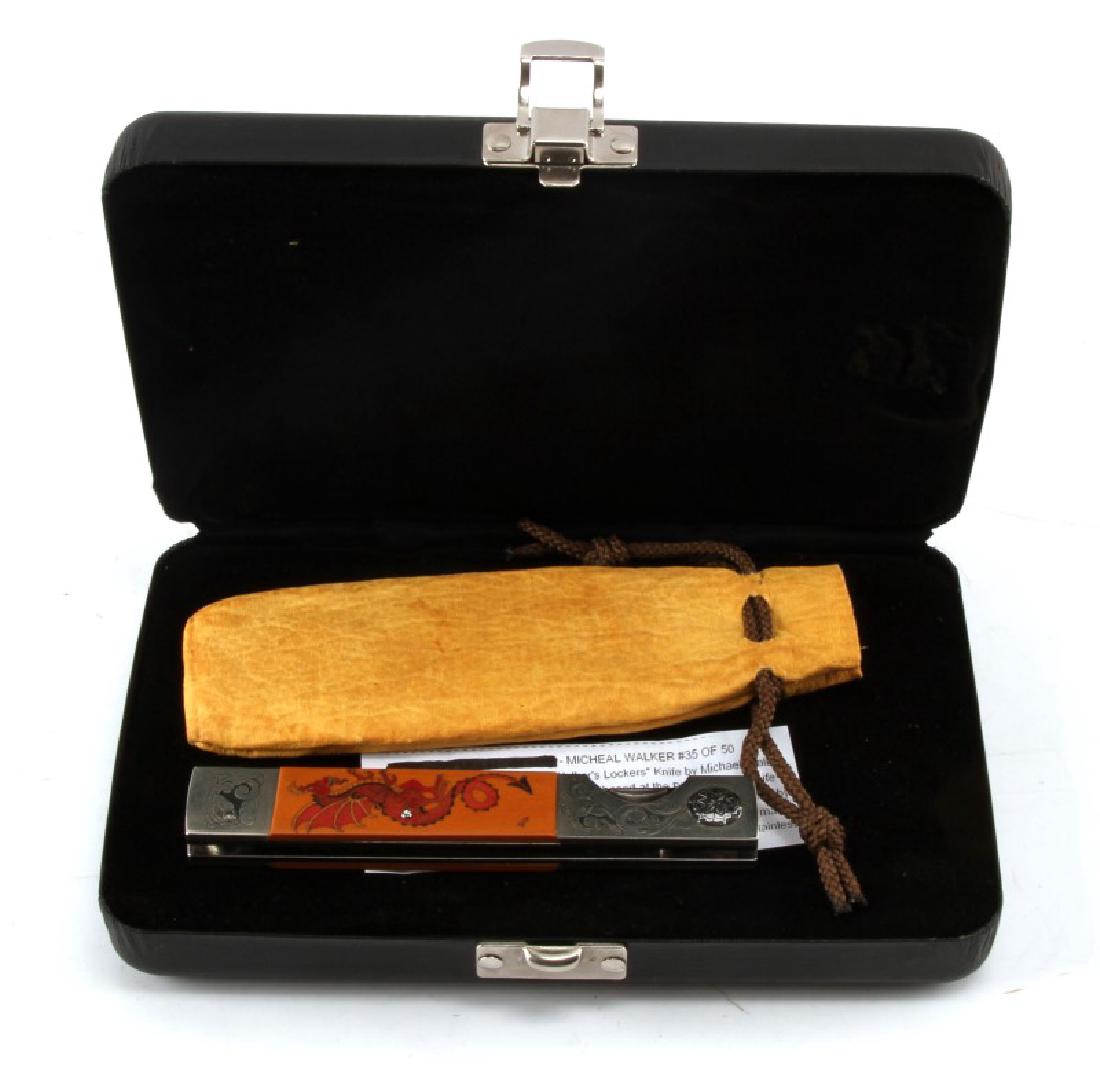 MICHEAL WALKER SCRIMSHAW TANTO KNIFE #35 OF 50: "Walker's Lockers" Knife by Michael Walker made in early 1980's and originally purchased at the Plaza Cutlery Knife Show in Costa Mesa, Ca.. Engraved bolsters and Micarta scrimshawed by his wife Patri