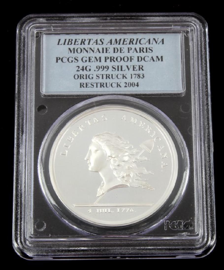 LIBERTAS AMERICANA MONNAIE DE PARIS PCGS GEM PROOF: Deep cameo, original struck 1783 re struck 2004. 24G .999 fine silver, stunning example.