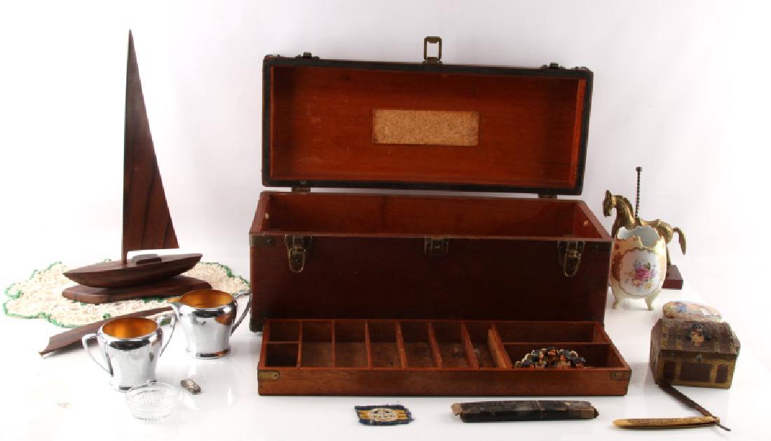 LARGE GENERAL COLLECTIBLE BOX MIXED ITEMS: Large general collectible box with mixed items. Varies from antique to modern. Includes but not limited to Pet Milk, Rocks, China, Treasure Box, Boy Scout Memorabilia, Zig Zag Rolling Papers, Toys, Po