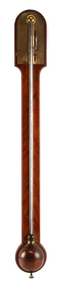 VINTAGE BATE LONDON WOOD & BRASS STICK BAROMETER: 37" Bate London Stick Barometer. Wood is mahogany and walnut. Veneer finish. Brass gauge plate. Mercury. Very nice finish to wood and nice wear/coloring to brass. Small crack in wood at top right of p