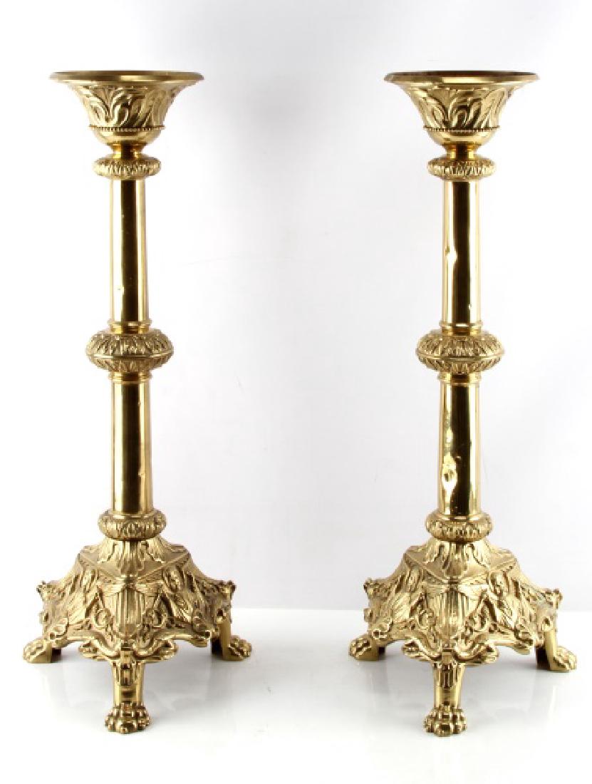 LOT OF 2 BRASS CLAWFOOT TABLE LAMP BASES: Brass (?) lamps measure approx. 25" high and are fitted with holes and threading for a power cord, light fixture and globe. Some dents to body. Nice detail.