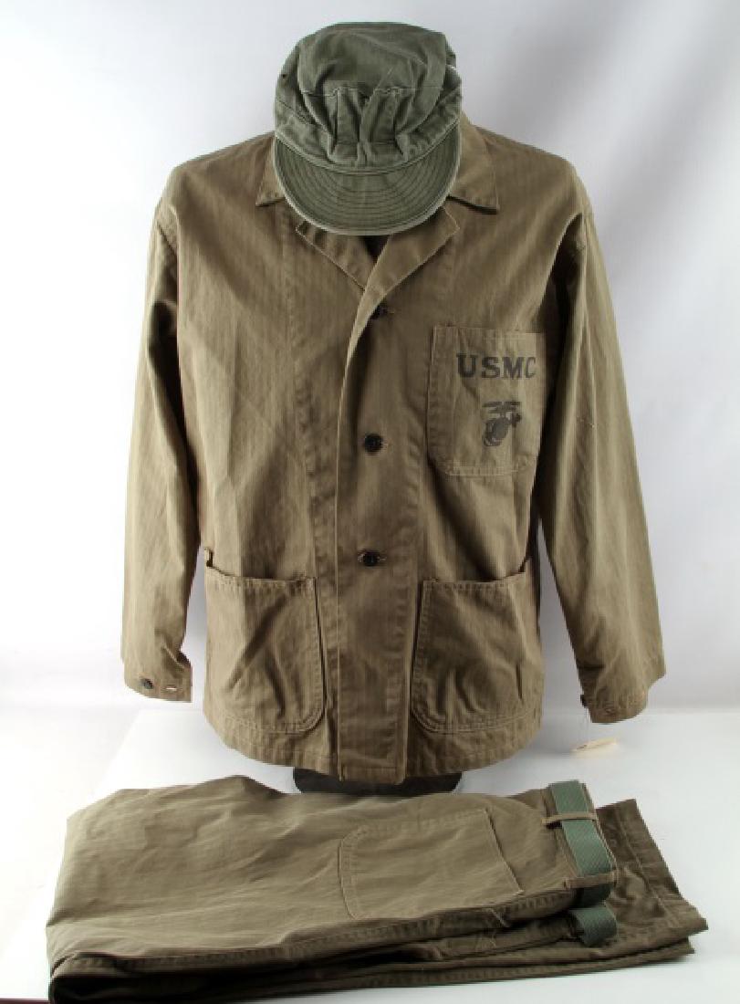 WWII USMC HBT HERRING BONE TWILL P1941 UNIFORM: Kirkman Mfg. 1942 stamped medium 3 pocket blouse, with EGA on pocket, trousers are not marked and are about a size 31, these 2 items appear unissued. The block cap has faint EGA and has moderate servi