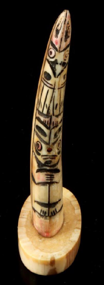 FOSSIL WALRUS TUSK NATIVE AMERICAN MADE TOTEM POLE: On a fossil tusk base, totem stands 5 1/2 inches.