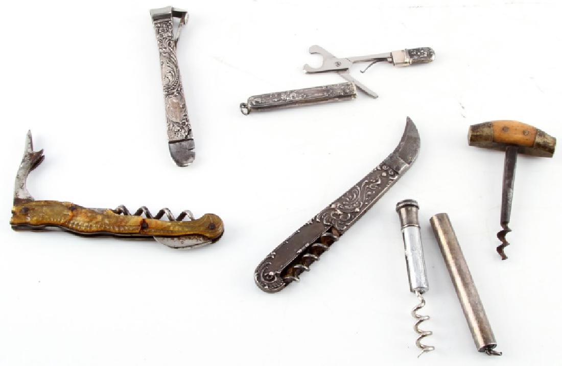 ANTIQUE CIGAR CUTTER & CORK SCREW LOT SOME STERLIN: Includes sterling cased Cigar scissors, bone and brass Victorian cork screw, sterling cigar cutter, sterling cigar cutter with corkscrew, Cellulite alligator Cigar cutter and cork screw and a cased co