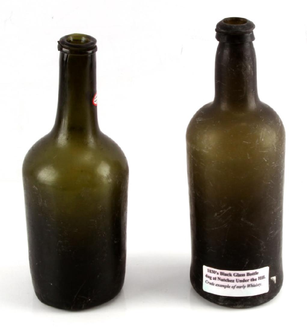 2 ANTIQUE MALLET OPEN & GROUND PONTIL GLASSES: Open pontil bottle has tag indicating it is "From a Creek Site in Elmore County Alabama". Measures 9 3/4" tall. The second has a ground pontil base and measures approximately 10 1/4" tall, with a tag 