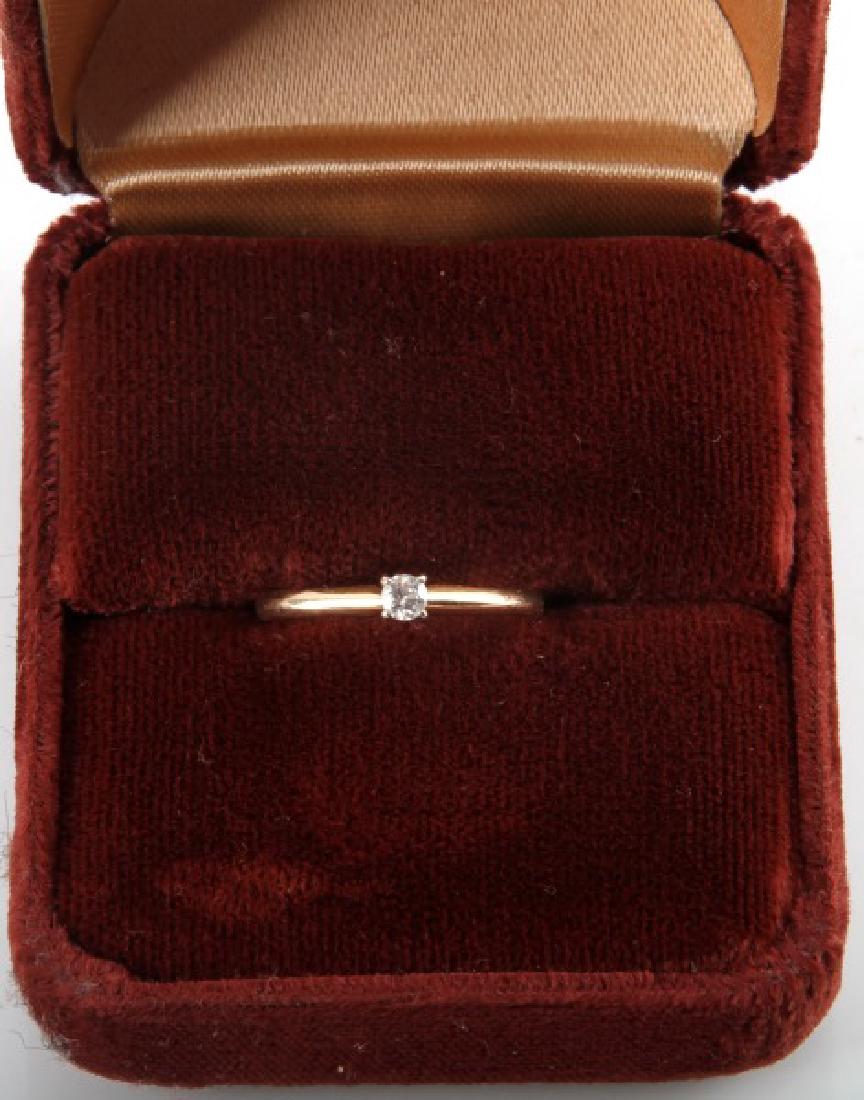 LADIES 10K YG SOLITAIRE DIAMOND RING 0.06 TCW: Features a 2.5mm diamond. VS1 clarity, K-M in color.