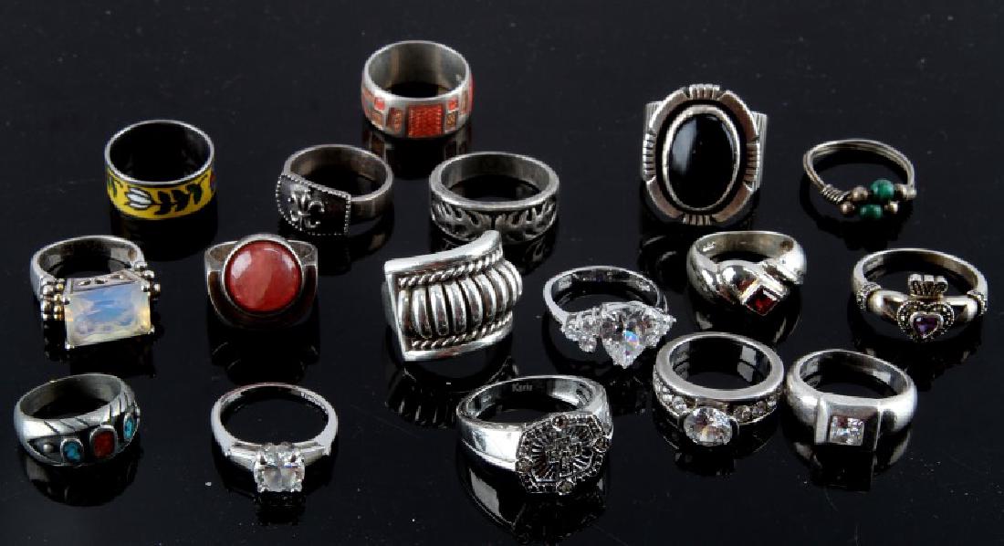 GROUPING OF 17 ASSORTED STERLING SILVER RINGS: Lot of 17 Assorted Sterling Silver rings of various sizes, designs, stones and countries of manufacture. Rings include enamel, turquoise, onyx, Cubic Zirconia, Carnelian, and Amethyst. In good conditi